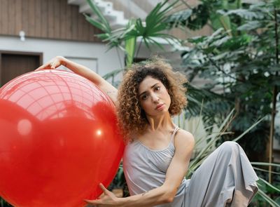 Person balancing on one leg, demonstrating focus and stability.